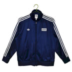 Giacca Oasis x Adidas 2025