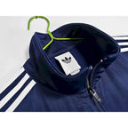 Giacca Oasis x Adidas 2025