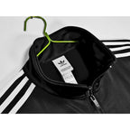 Giacca Oasis x Adidas 2025